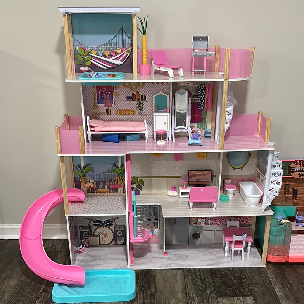 Pink Dollhouse with Accessories and Furniture